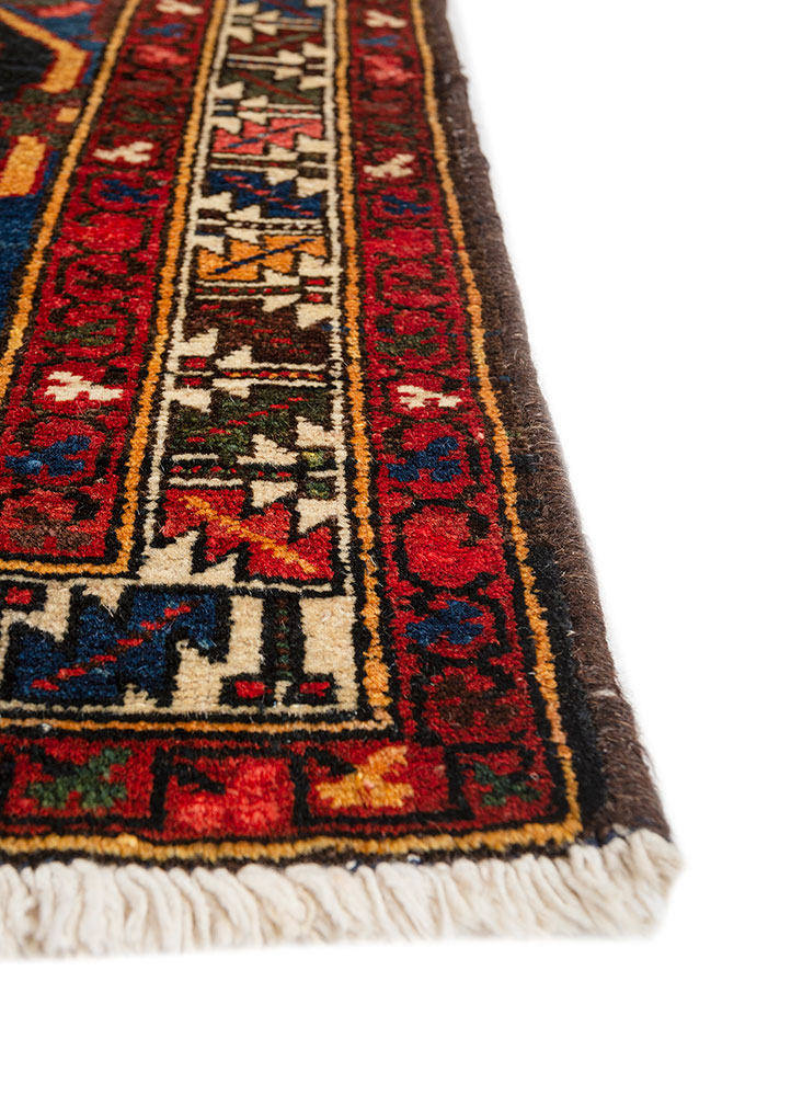 aalam red and orange wool hand knotted Rug - Corner
