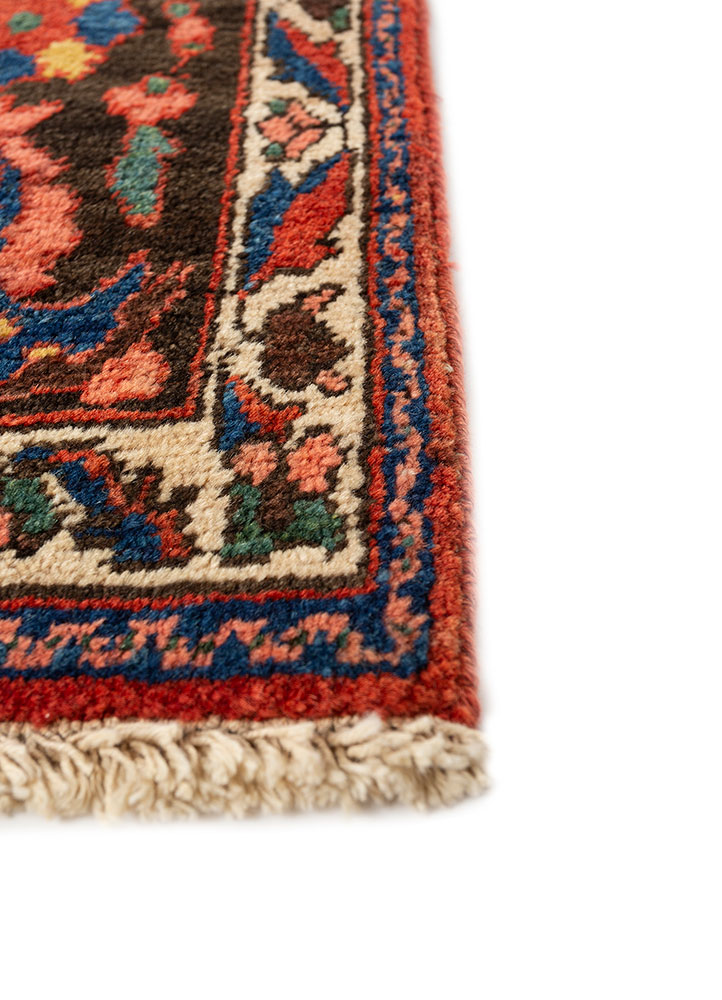 aalam red and orange wool hand knotted Rug - Corner