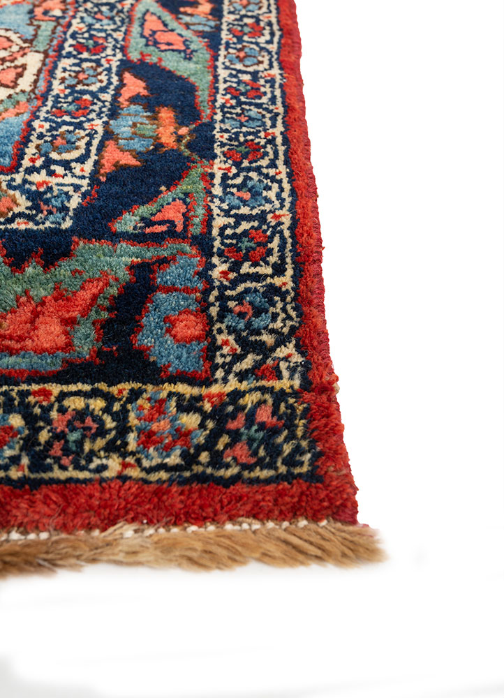 aalam red and orange wool hand knotted Rug - Corner