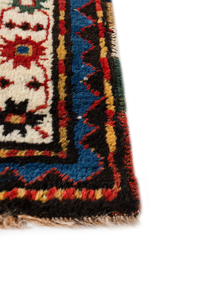 aalam red and orange wool hand knotted Rug - Corner
