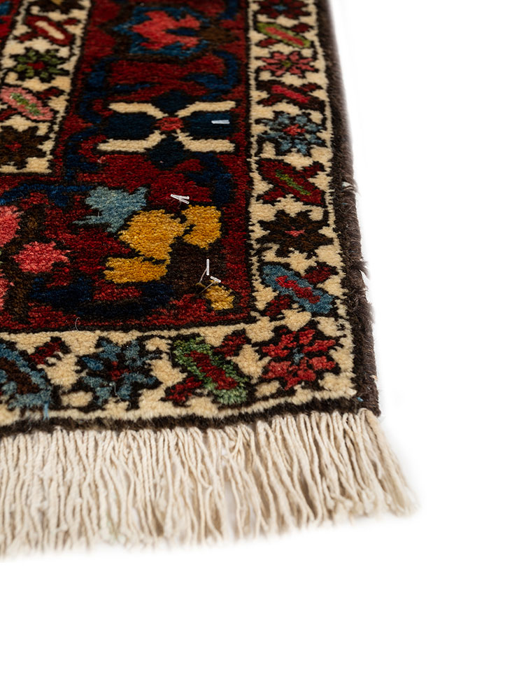 aalam red and orange wool hand knotted Rug - Corner