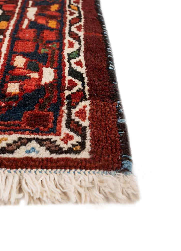 aalam red and orange wool hand knotted Rug - Corner