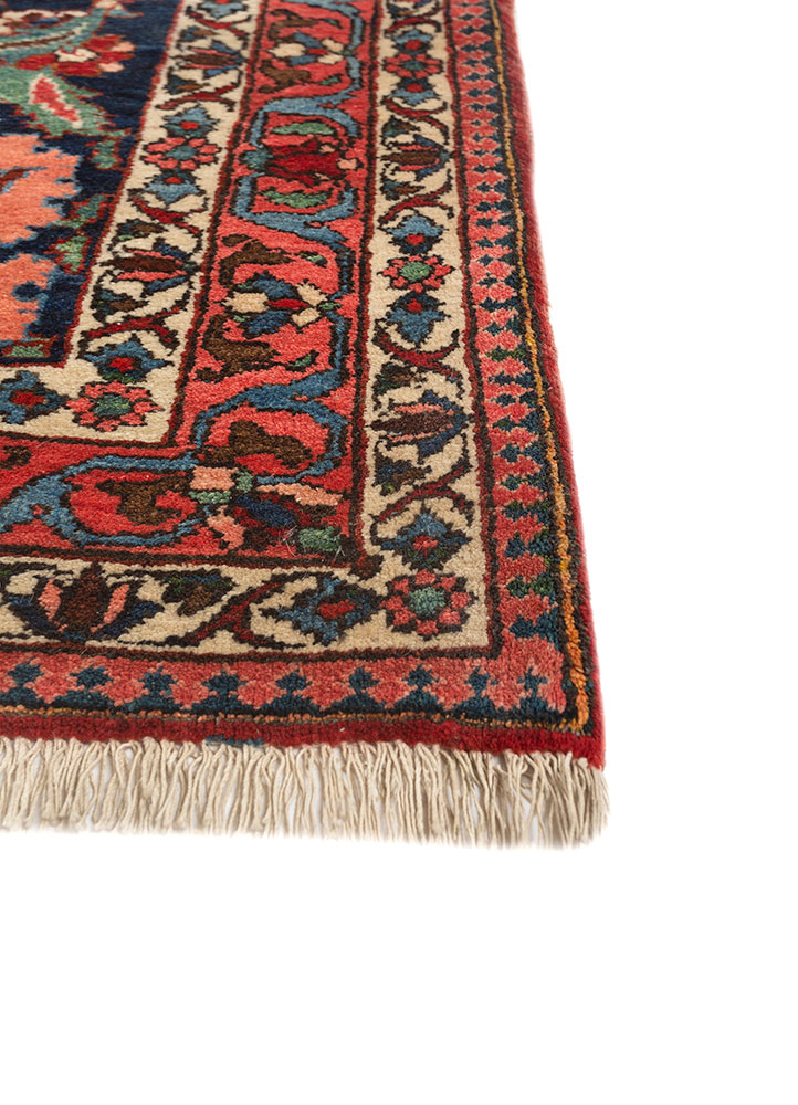 aalam red and orange wool hand knotted Rug - Corner