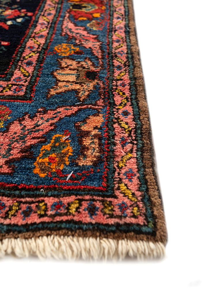aalam red and orange wool hand knotted Rug - Corner