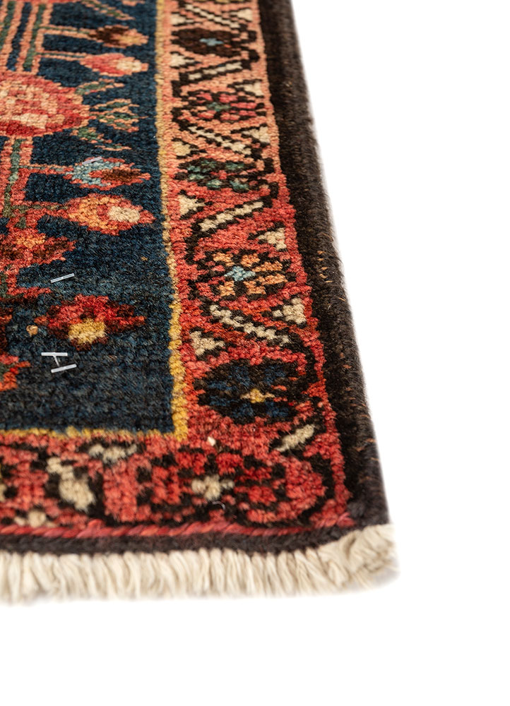 aalam red and orange wool hand knotted Rug - Corner