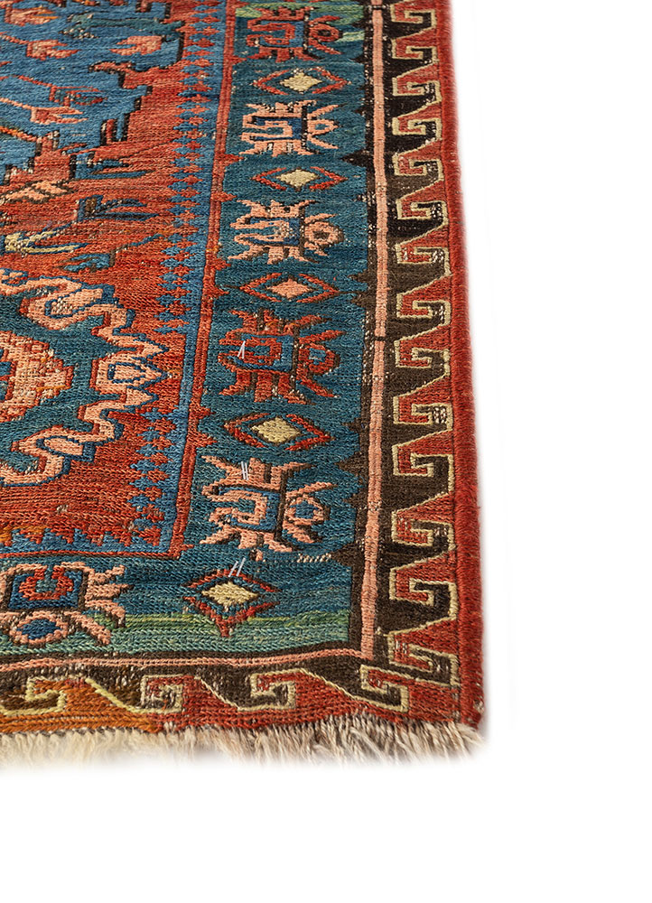 aalam red and orange wool hand knotted Rug - Corner