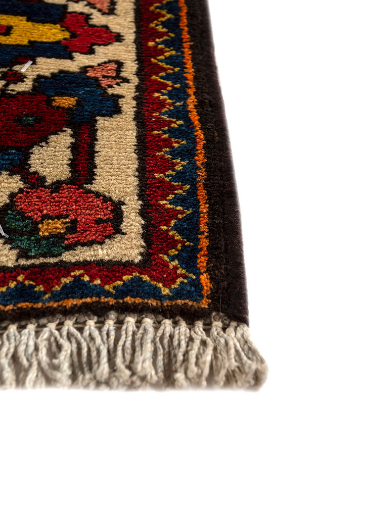 aalam red and orange wool hand knotted Rug - Corner