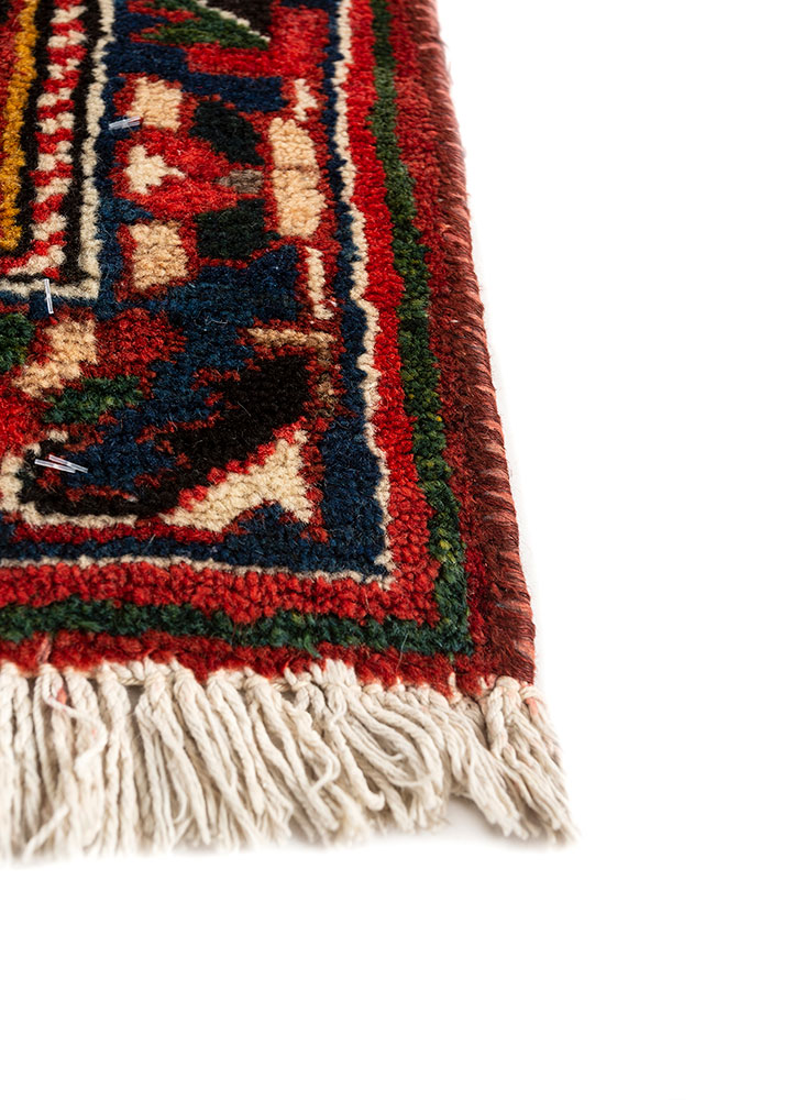 aalam red and orange wool hand knotted Rug - Corner