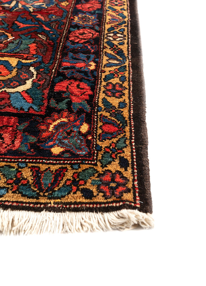 aalam red and orange wool hand knotted Rug - Corner