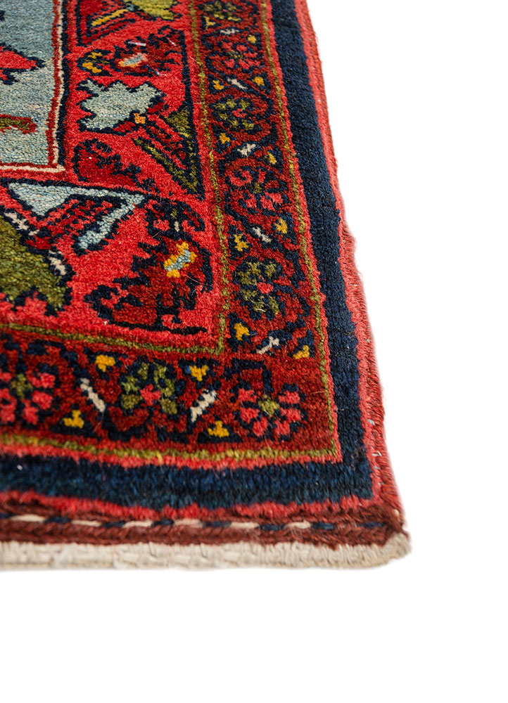 aalam red and orange wool hand knotted Rug - Corner