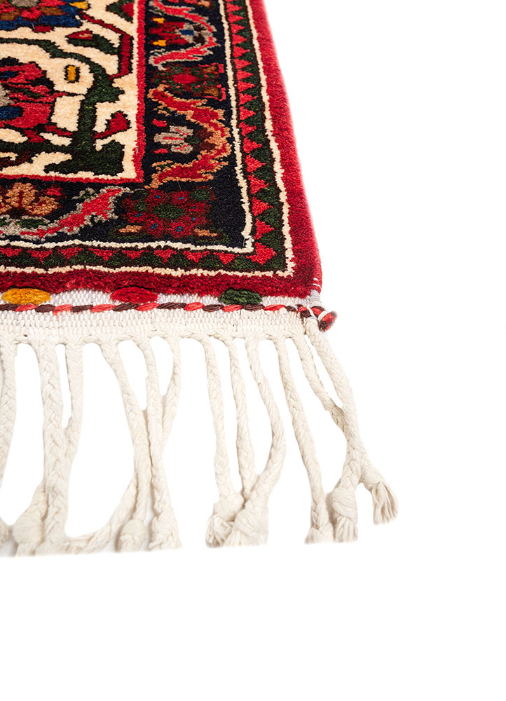 aalam red and orange wool hand knotted Rug - Corner