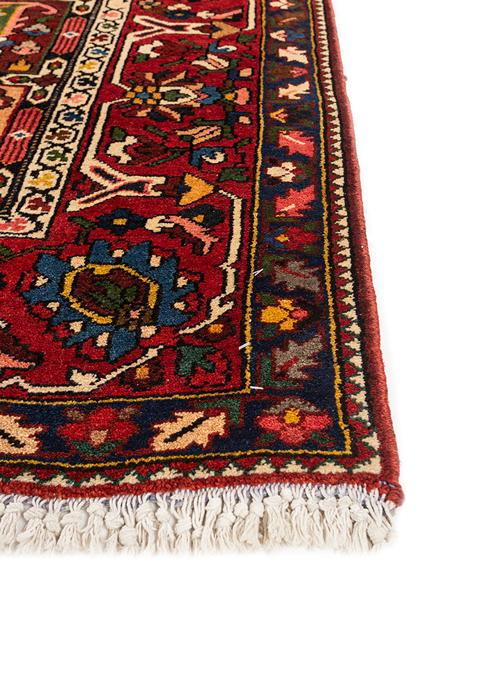 aalam red and orange wool hand knotted Rug - Corner