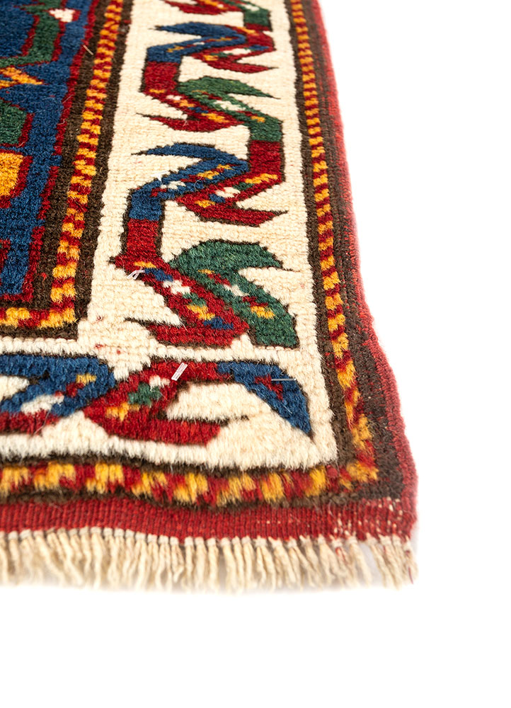aalam red and orange wool hand knotted Rug - Corner