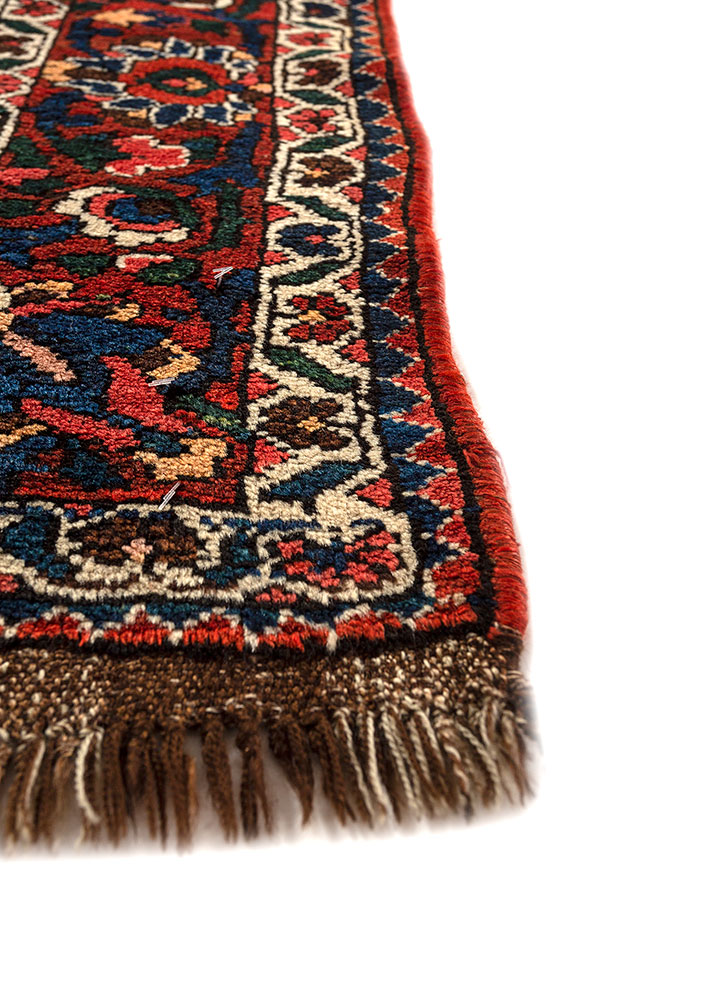 aalam red and orange wool hand knotted Rug - Corner