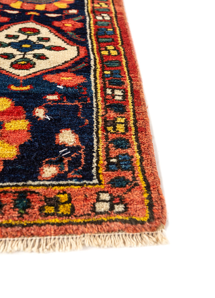 aalam red and orange wool hand knotted Rug - Corner