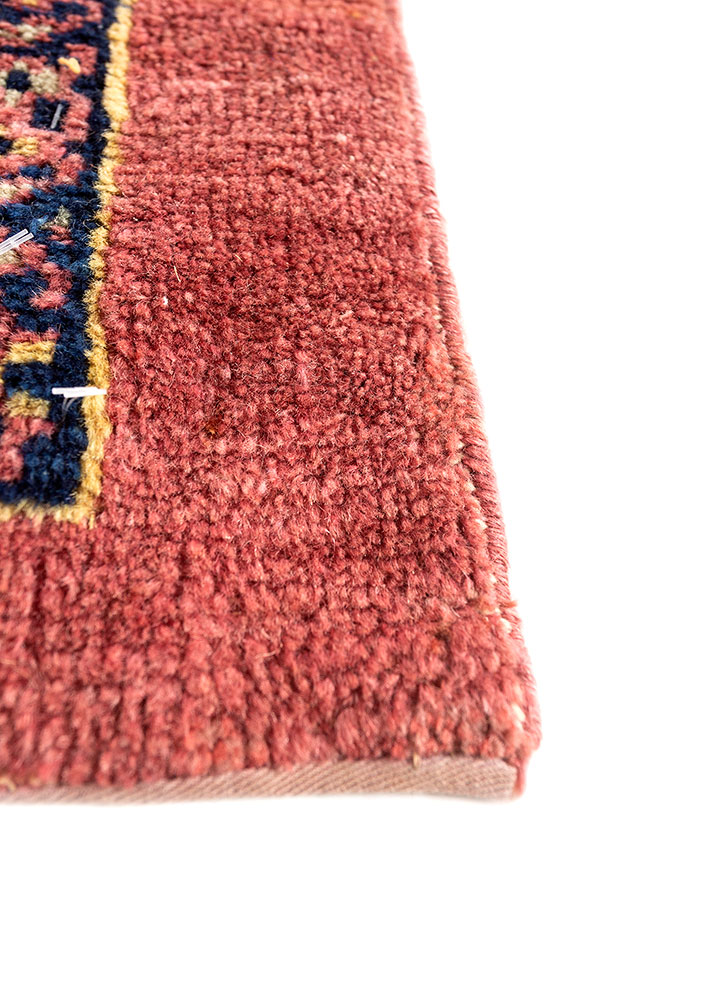 aalam red and orange wool hand knotted Rug - Corner