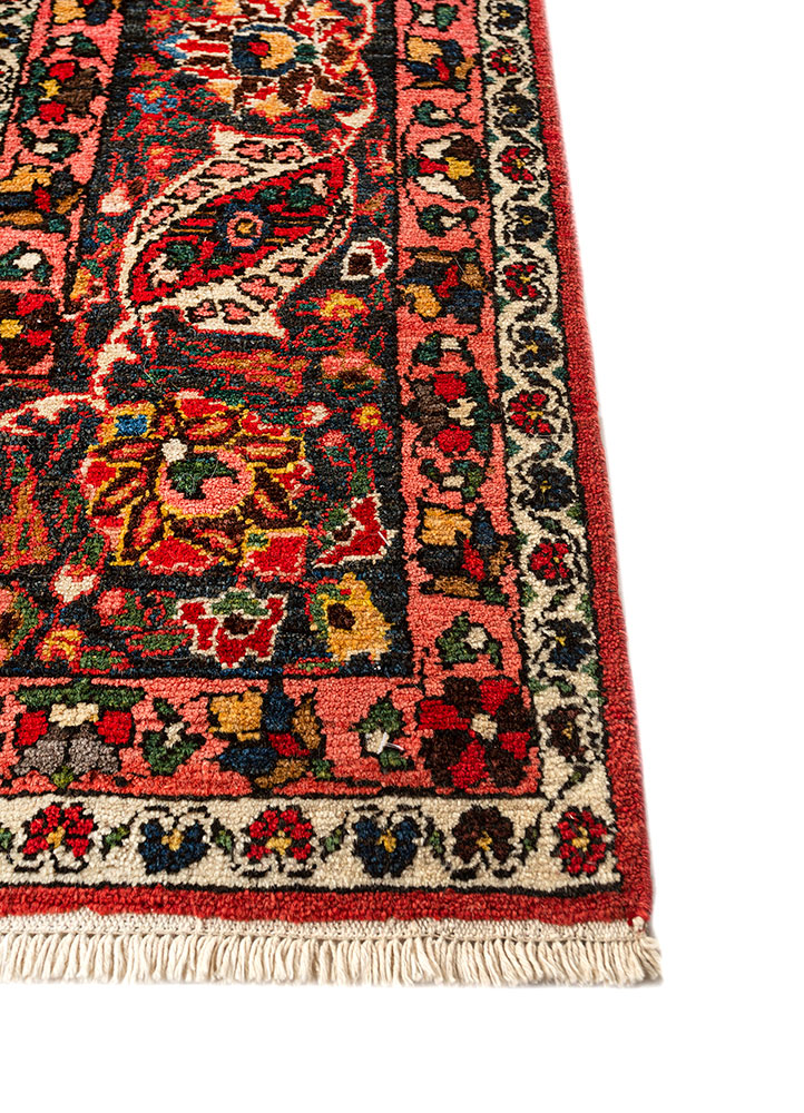 aalam red and orange wool hand knotted Rug - Corner