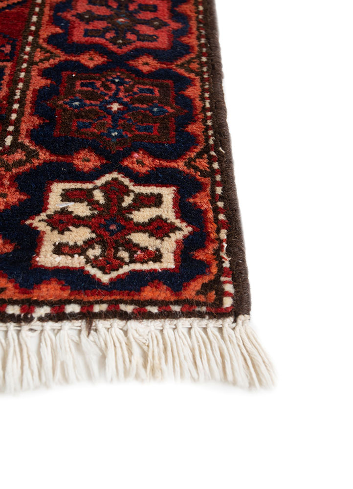 aalam red and orange wool hand knotted Rug - Corner