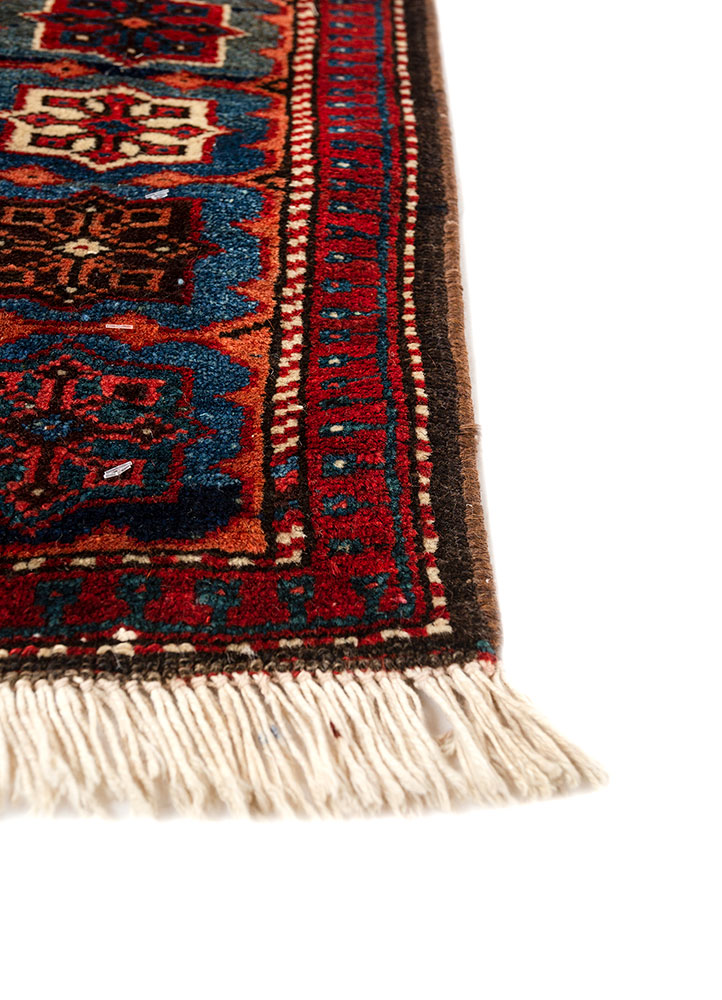 aalam red and orange wool hand knotted Rug - Corner