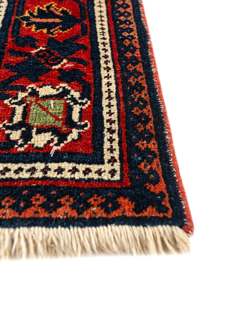 aalam red and orange wool hand knotted Rug - Corner