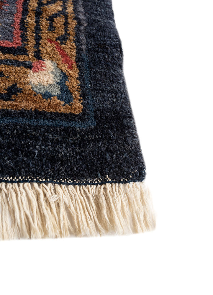 aalam red and orange wool hand knotted Rug - Corner