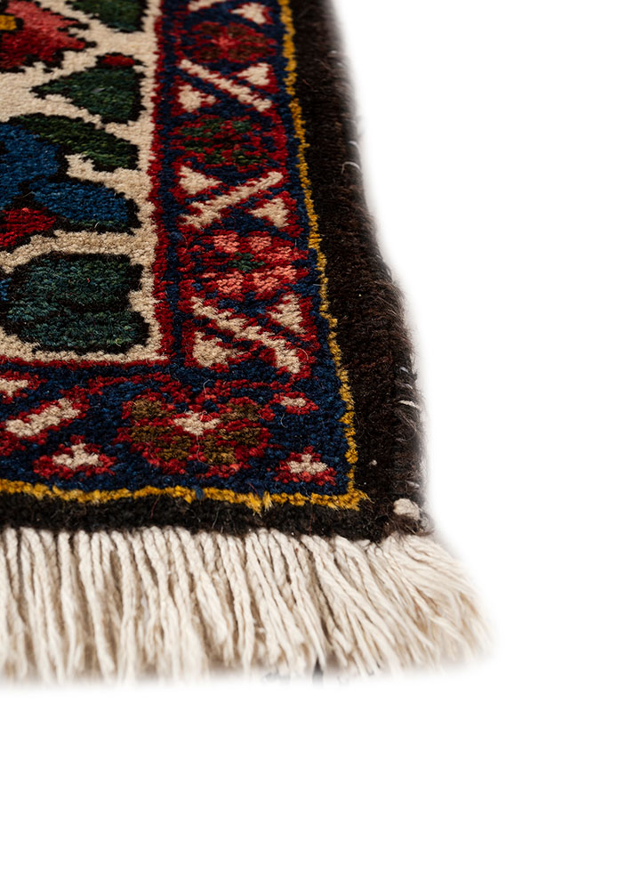 aalam red and orange wool hand knotted Rug - Corner