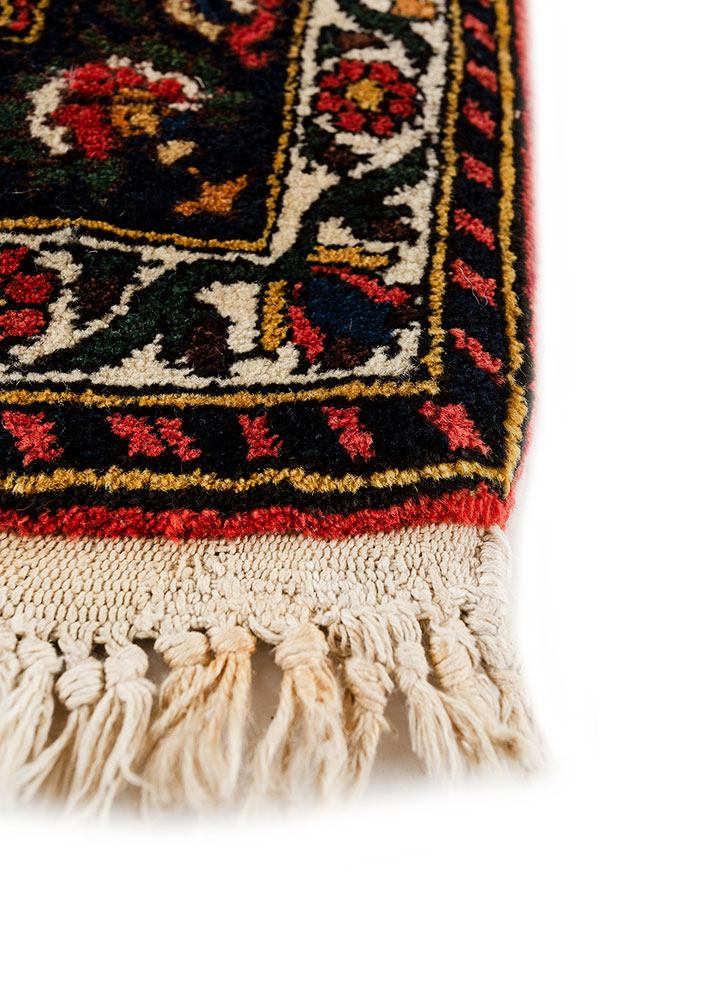 aalam red and orange wool hand knotted Rug - Corner