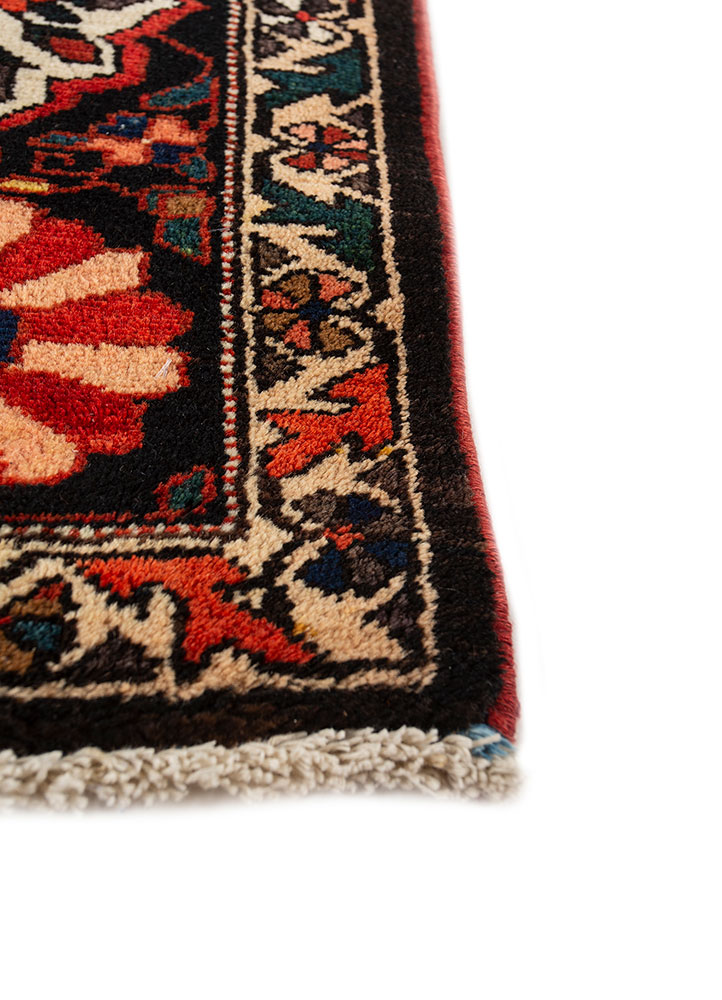 aalam red and orange wool hand knotted Rug - Corner