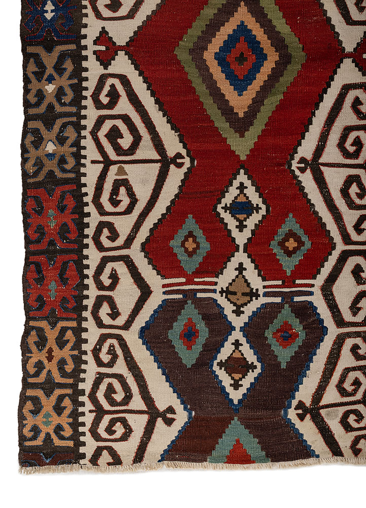 nayaab red and orange wool flat weaves Rug - Corner