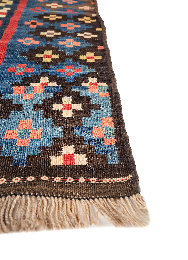 nayaab red and orange wool flat weaves Rug - Corner