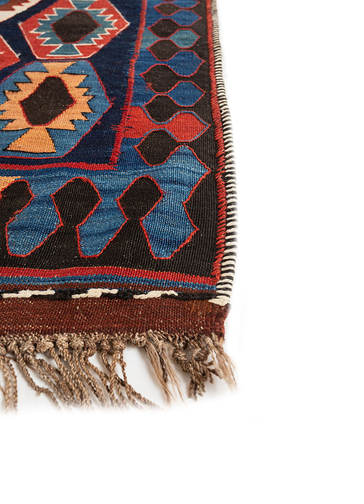 nayaab red and orange wool flat weaves Rug - Corner