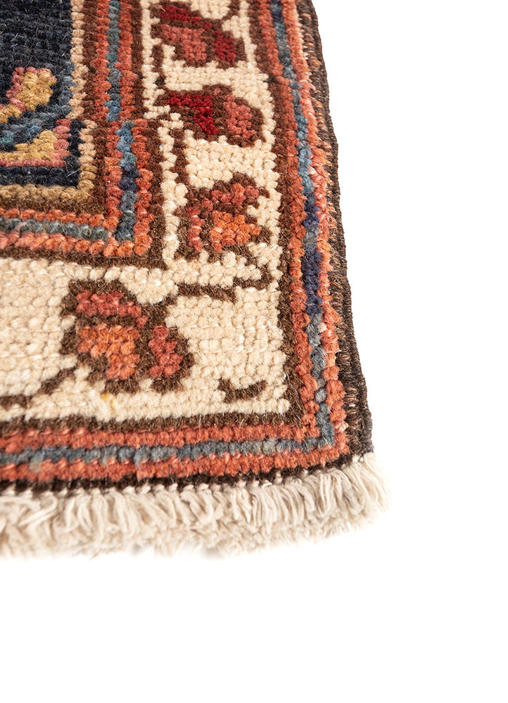 aalam red and orange wool hand knotted Rug - Corner