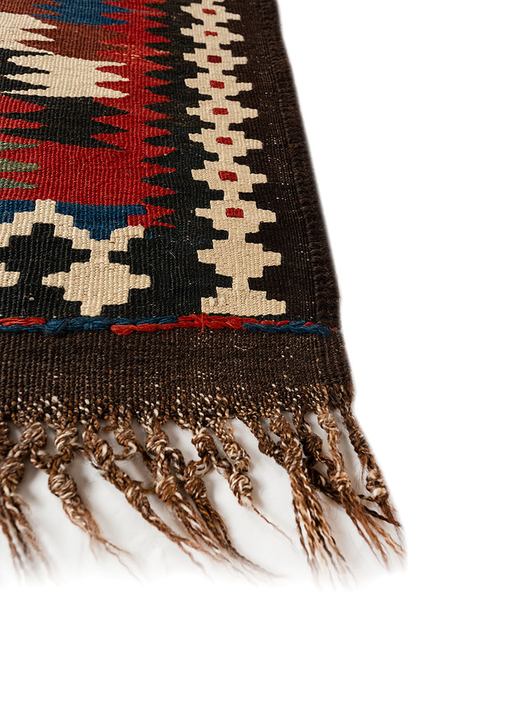 nayaab red and orange wool flat weaves Rug - Corner