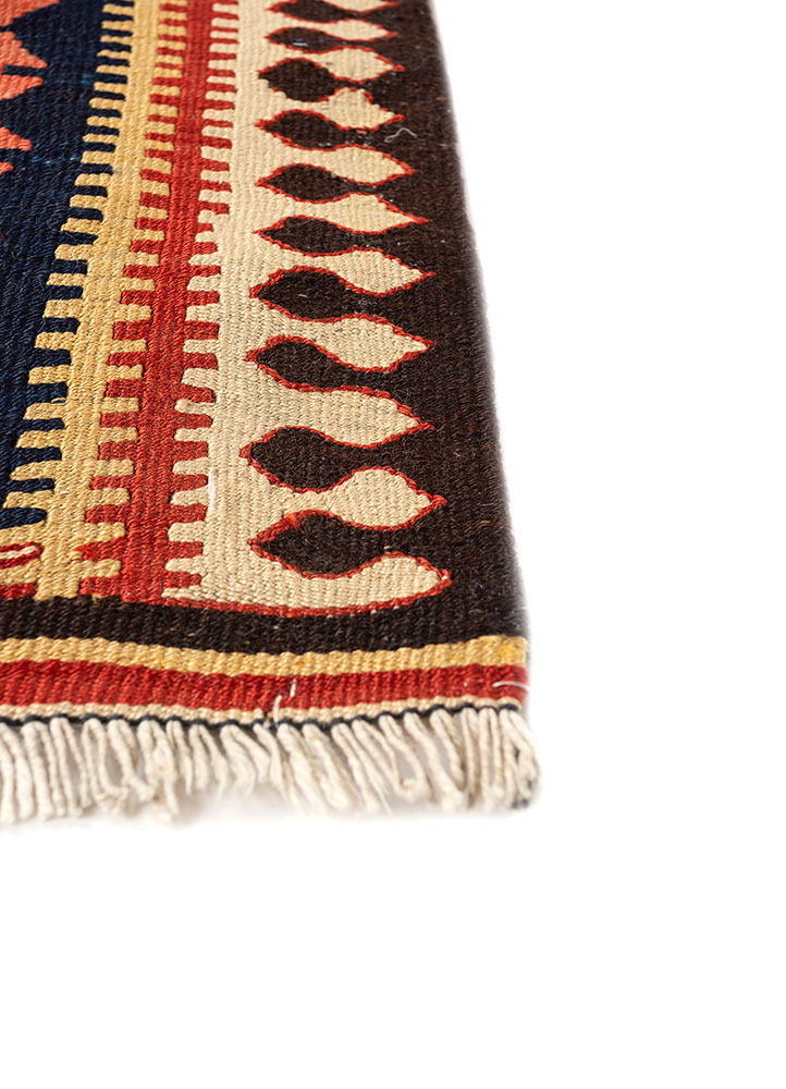 nayaab red and orange wool flat weaves Rug - Corner