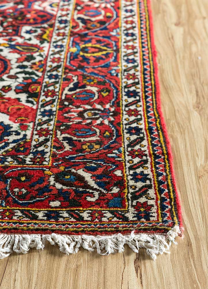 aalam red and orange wool hand knotted Rug - Corner