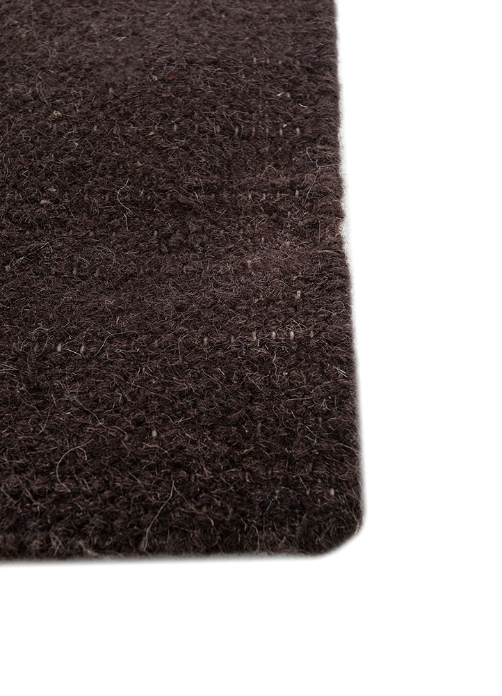 indusbar ivory wool flat weaves Rug - Corner