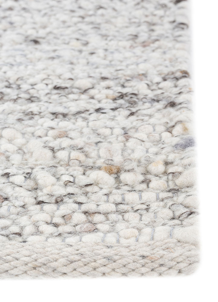 saga ivory wool hand loom Rug - Corner