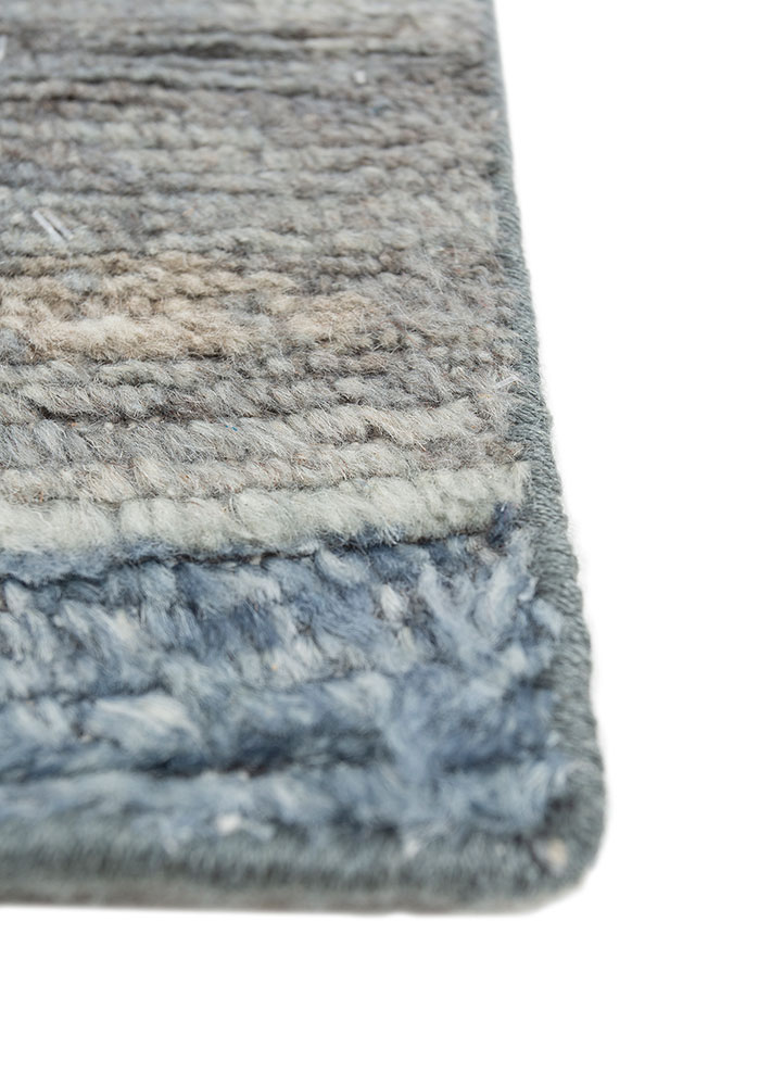 entropy blue wool hand knotted Rug - Corner