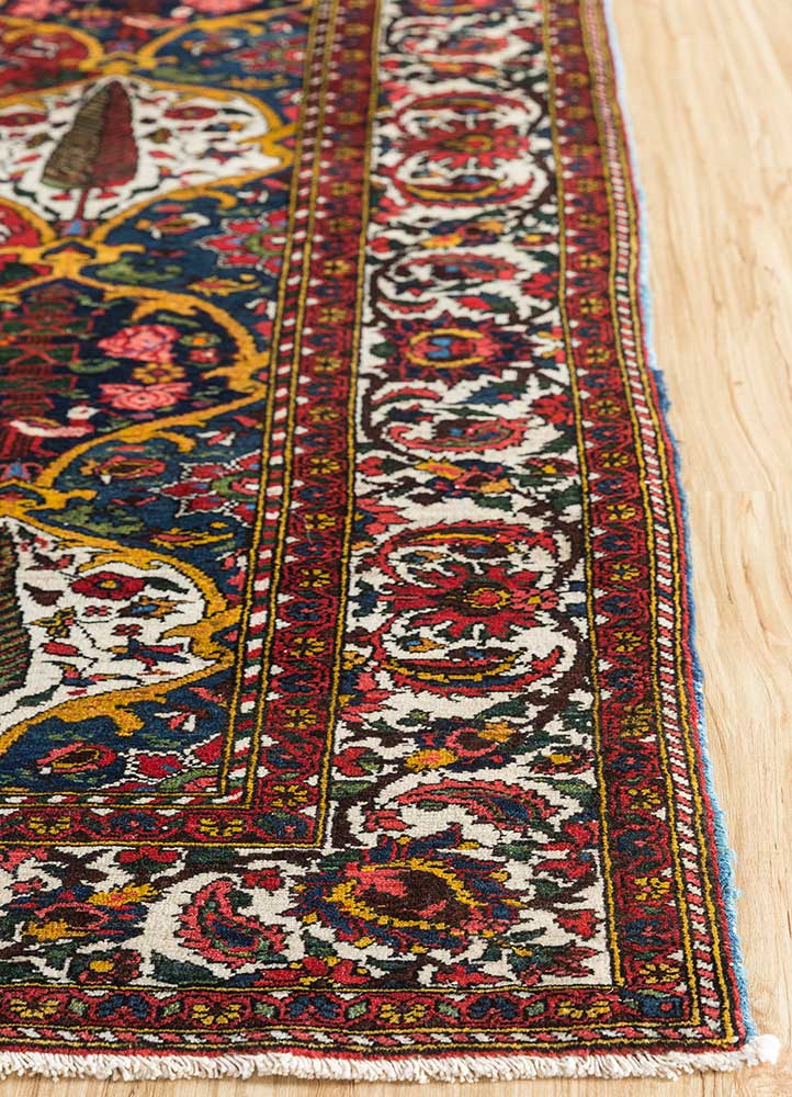aalam red and orange wool hand knotted Rug - Corner