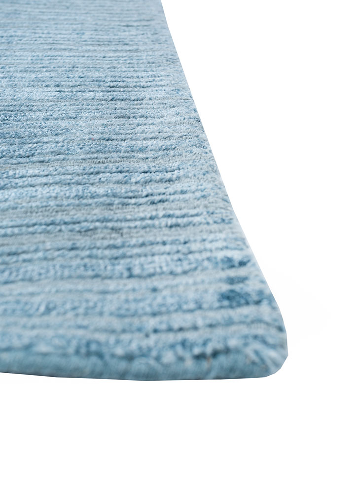 manifest blue wool and viscose hand knotted Rug - Corner