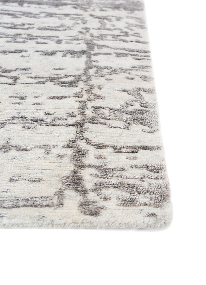 aprezo ivory wool and viscose hand knotted Rug - Corner