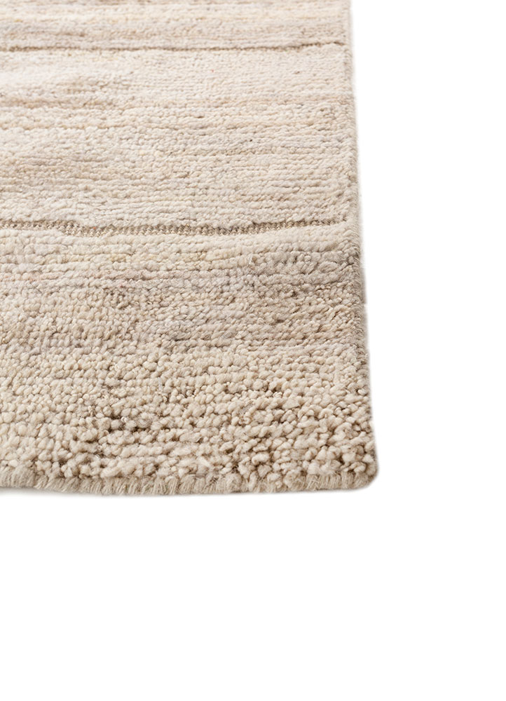 entropy ivory wool hand knotted Rug - Corner