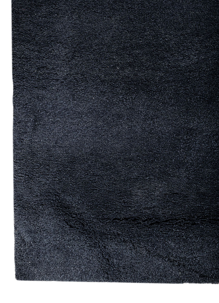 manifest blue wool and silk hand knotted Rug - Corner