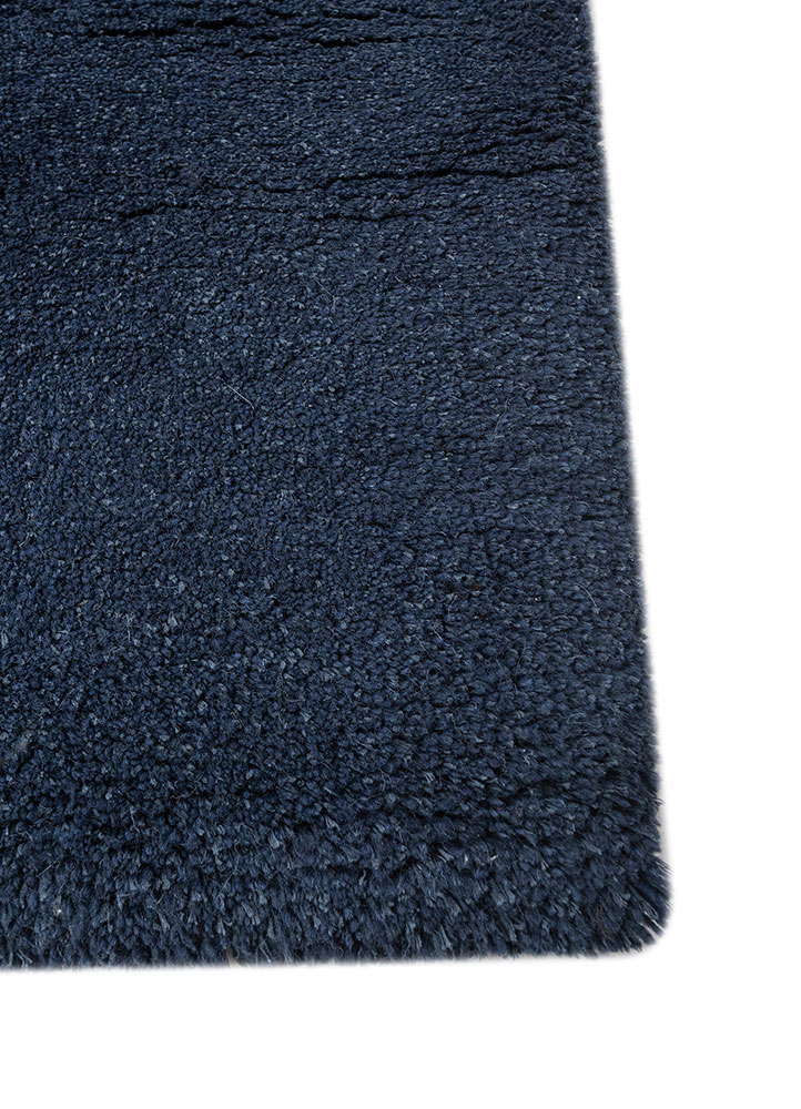 manifest blue wool and silk hand knotted Rug - Corner