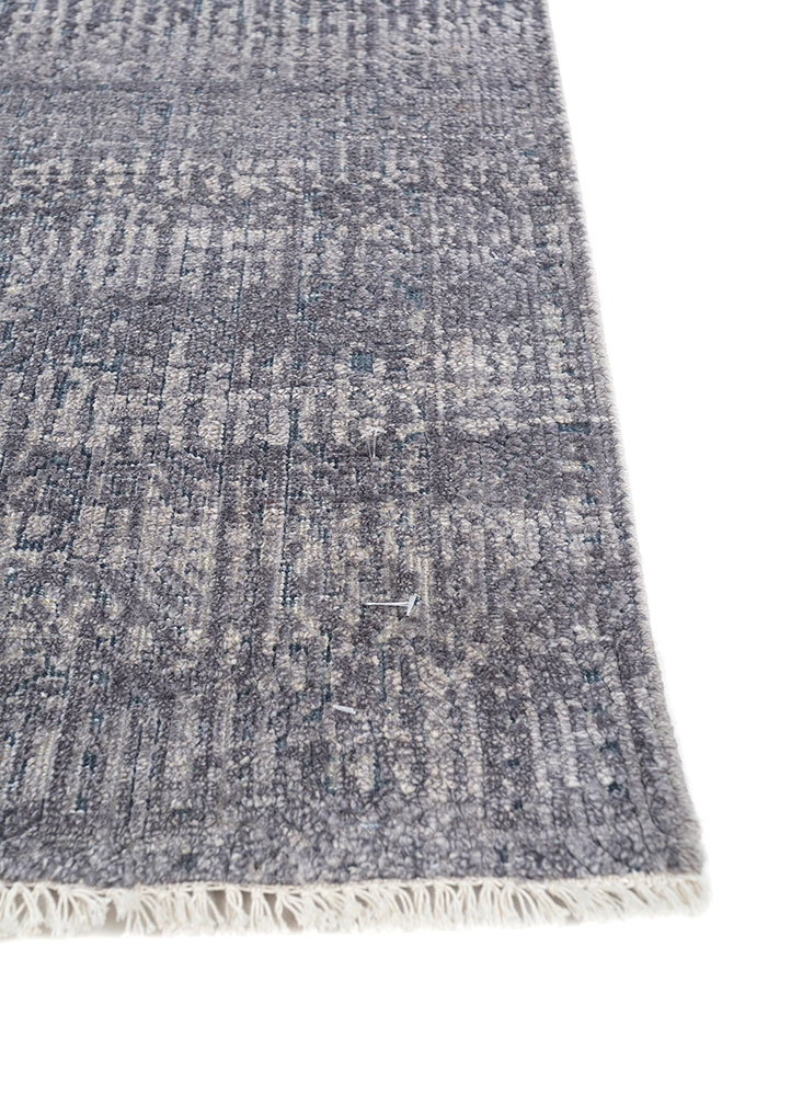 entropy blue wool and silk hand knotted Rug - Corner