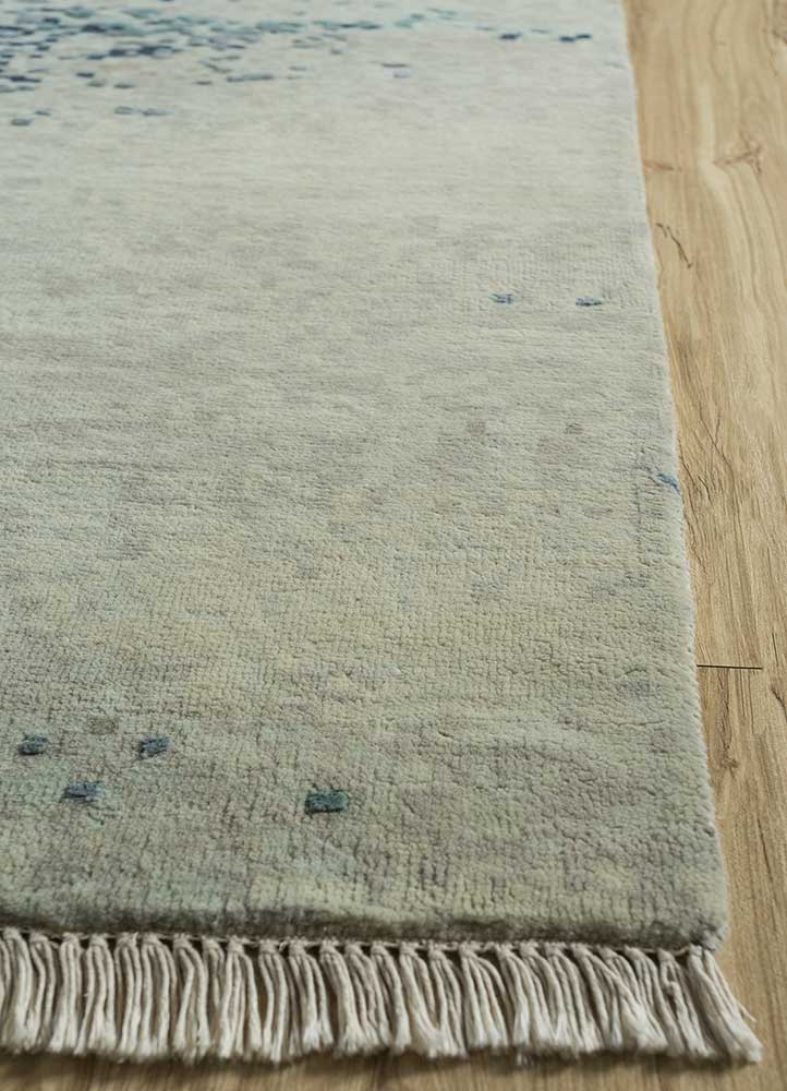 entropy blue wool and silk hand knotted Rug - Corner