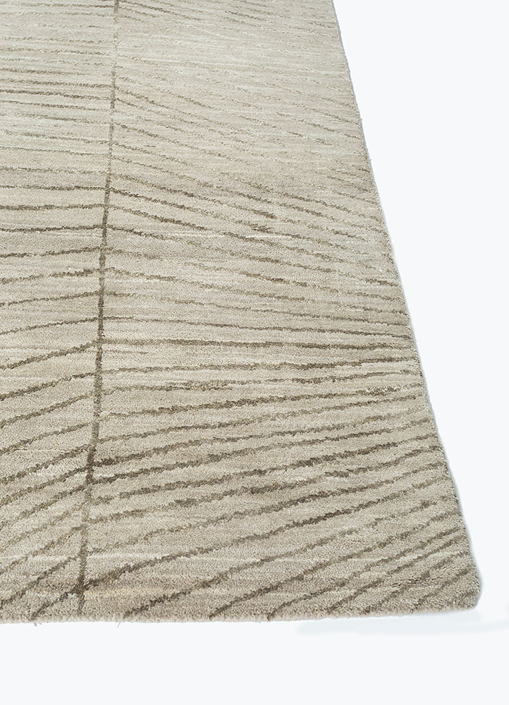 hidden by kavi ivory wool and silk hand knotted Rug - Corner