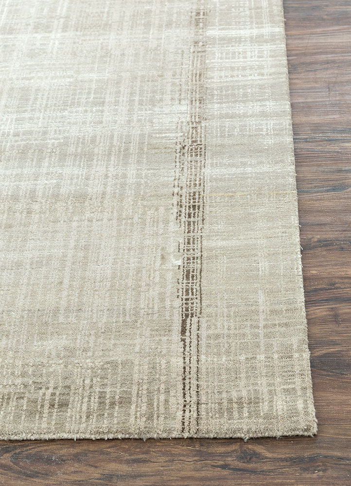unstring by kavi ivory wool and bamboo silk hand knotted Rug - Corner