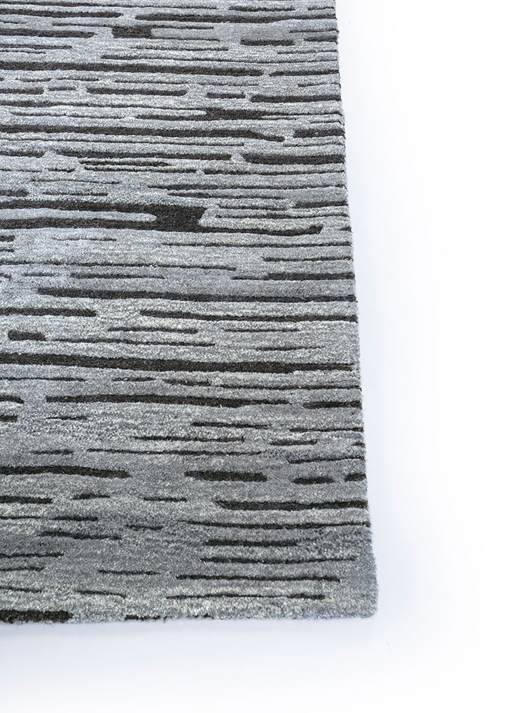 genesis grey and black wool hand tufted Rug - Corner