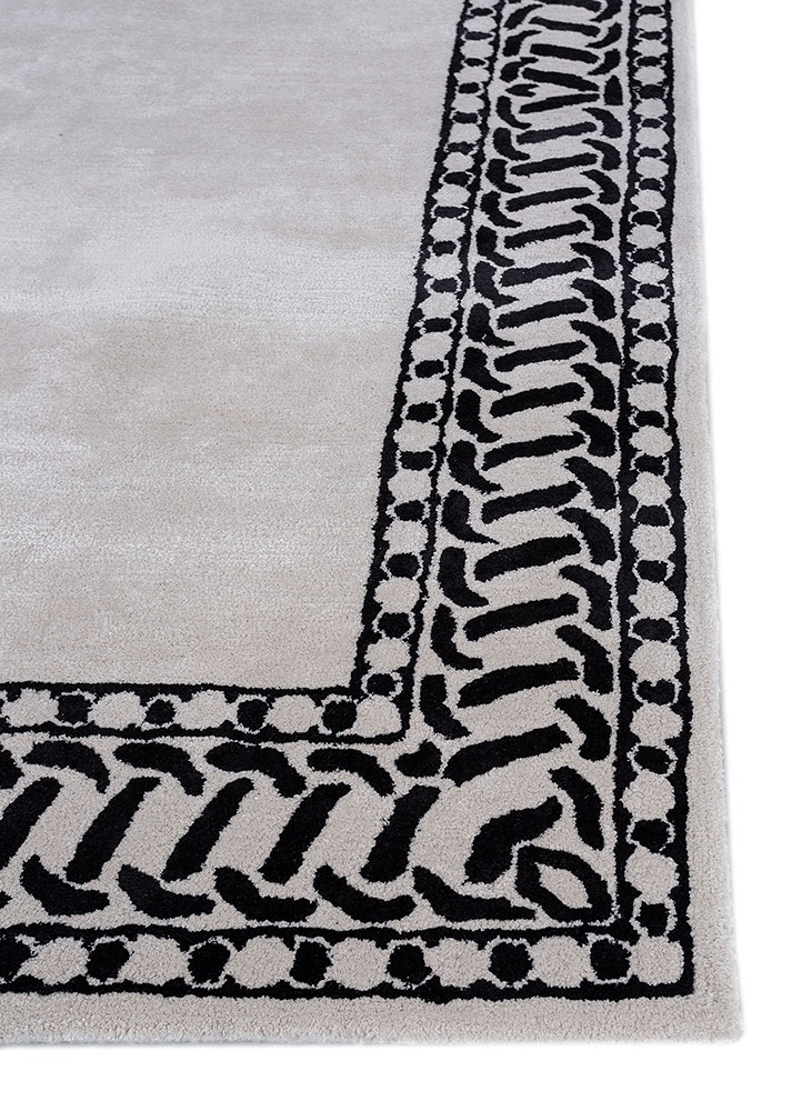 linear ivory wool and viscose hand tufted Rug - Corner